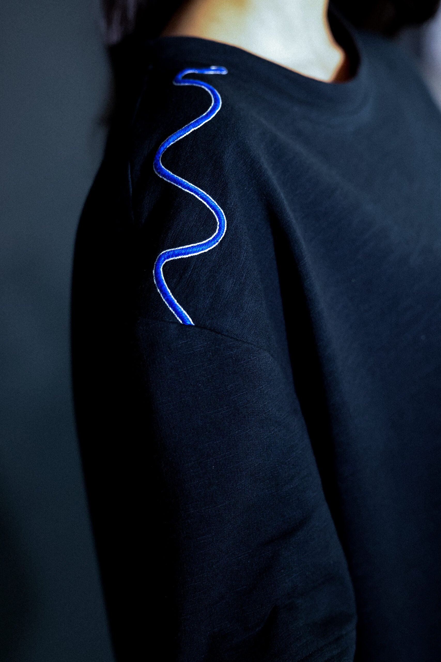 moon man on black tee